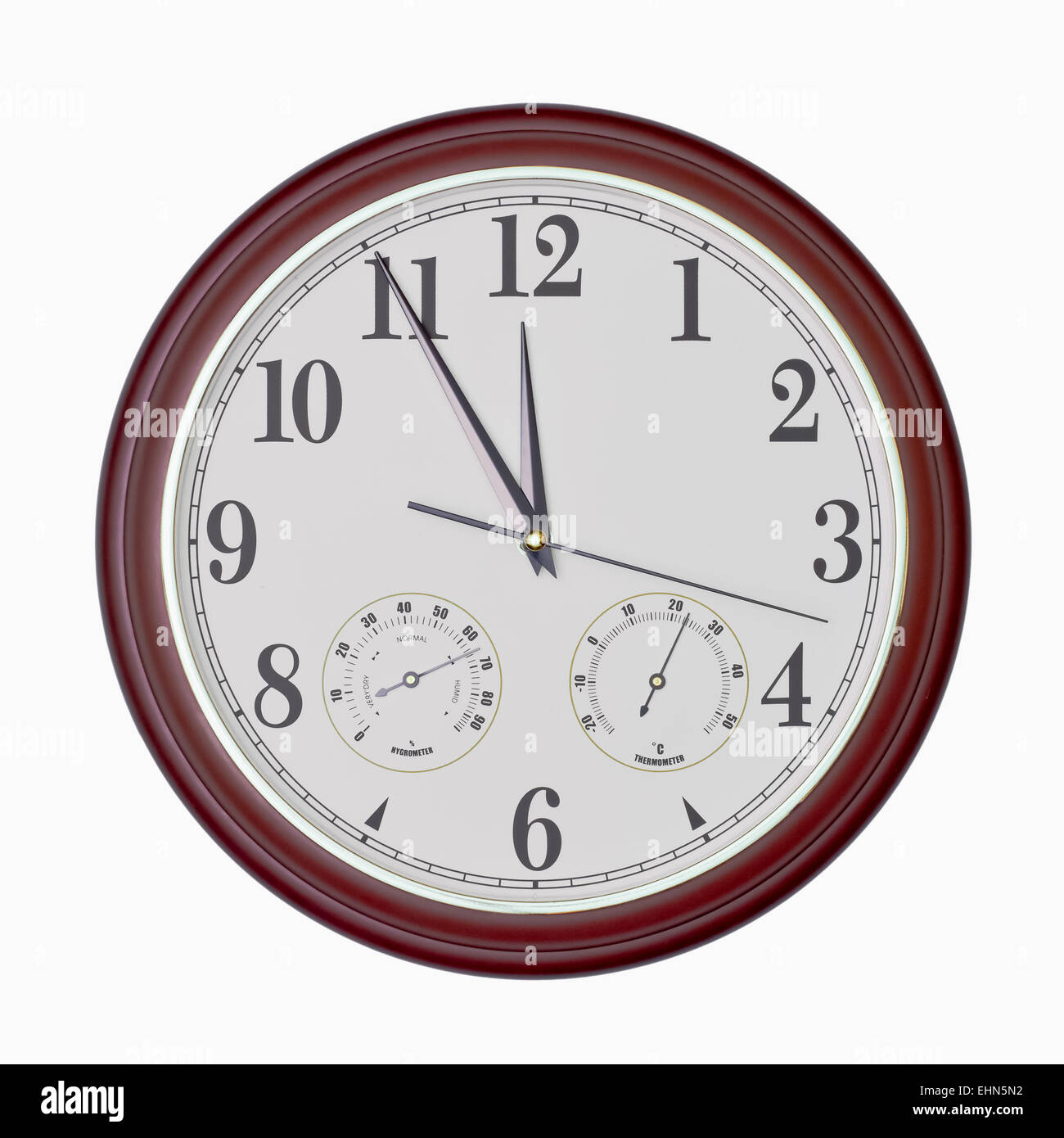 Quartz wall clock with hygrometer and thermometer isolated on white Stock Photo