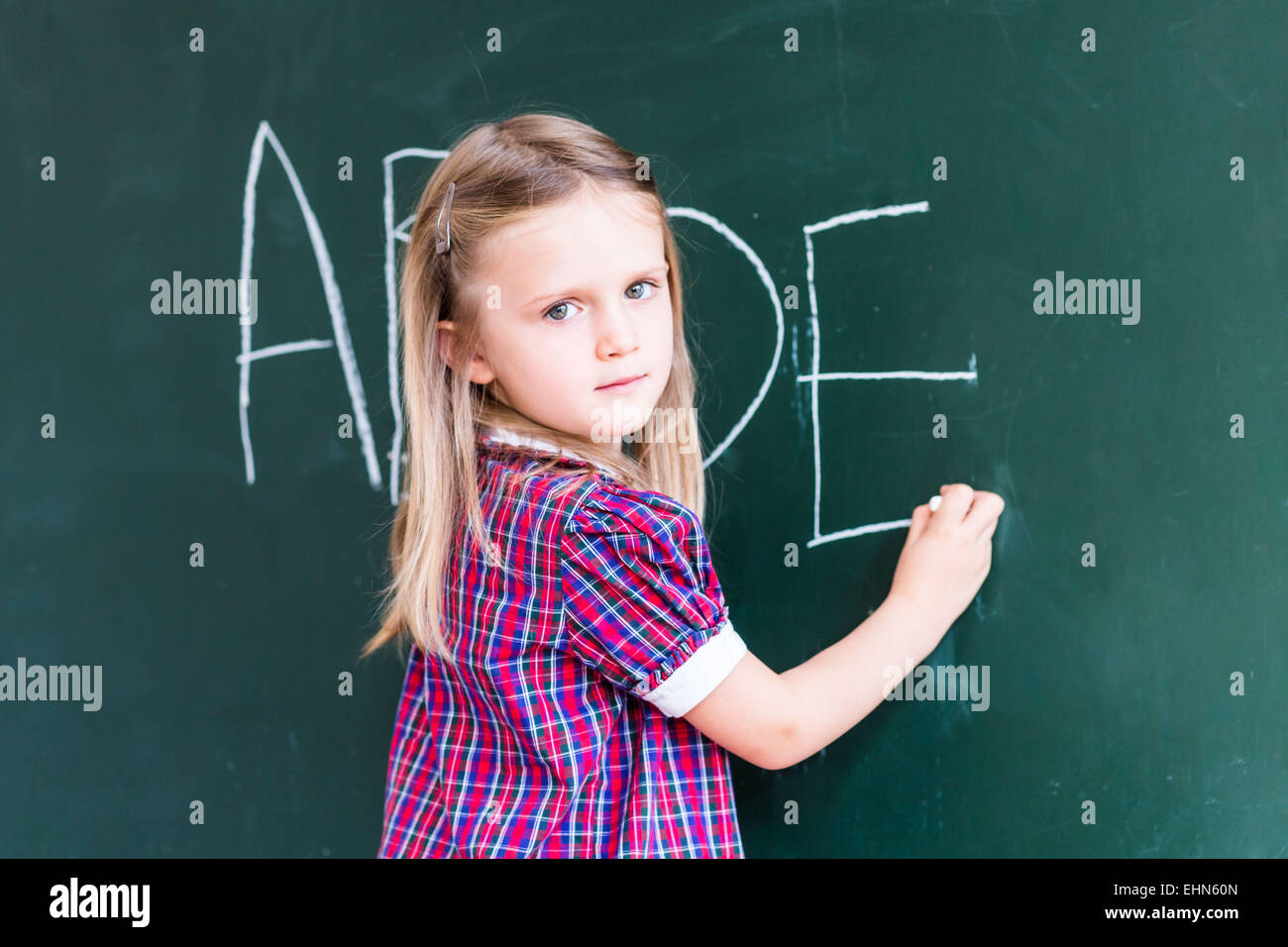 4 year old girl at school Stock Photo - Alamy