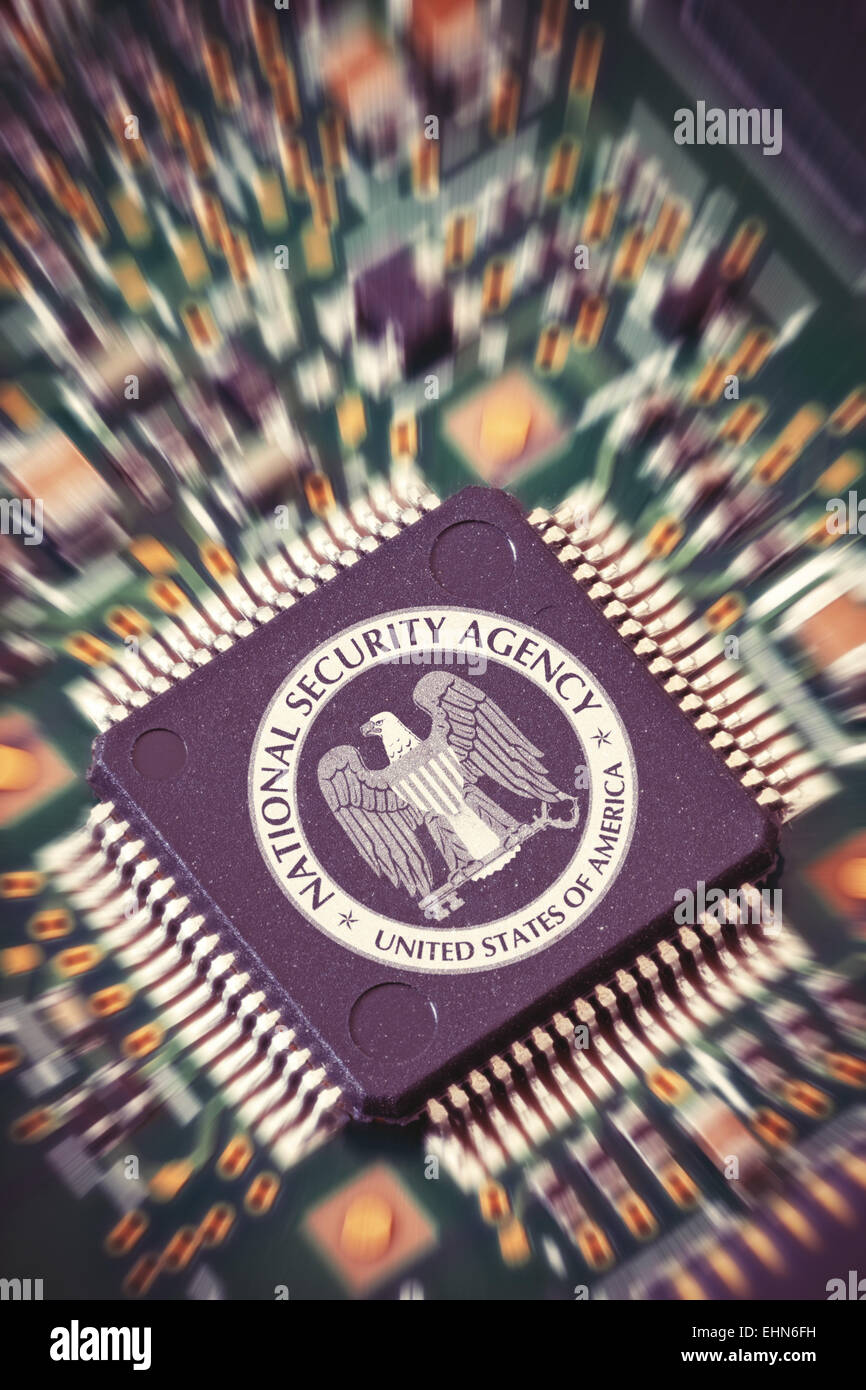 Circuit board with big NSA microchip Stock Photo