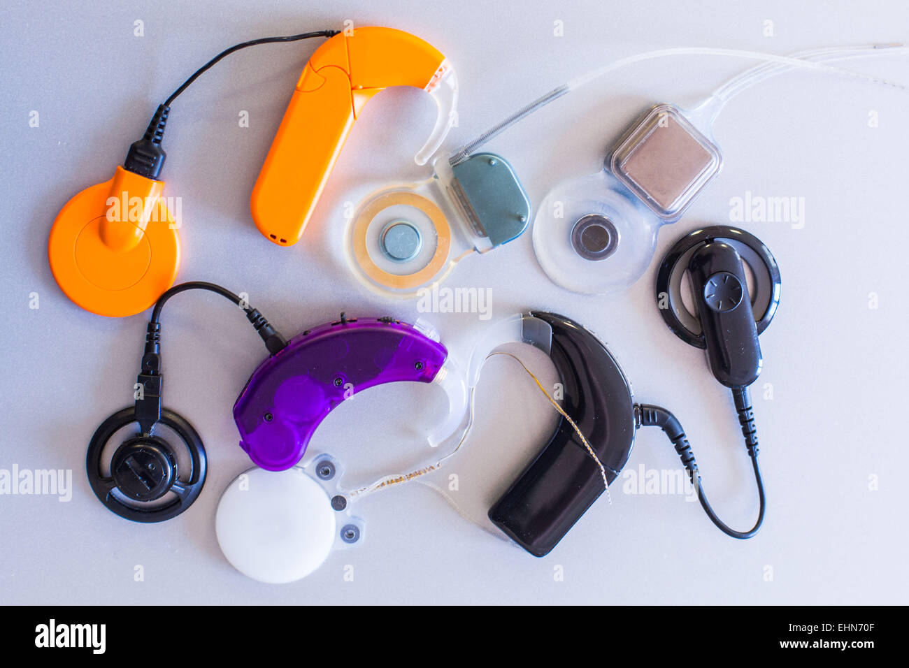 The receiver and electrode array components of a cochlear implant (CI) for deaf patients. Stock Photo