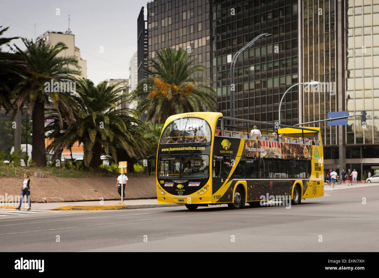 Argentina, Buenos Aires, Retiro, San Martin, yellow open top tourist bus Stock Photo