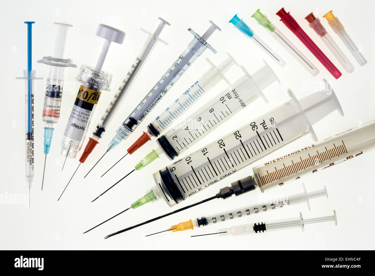 A selection of syringes and hypodermic needles used in medicine to give ...