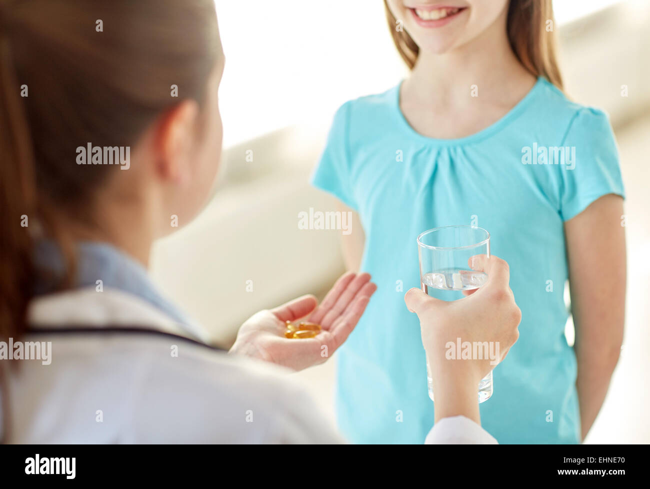 Close up doctor giving medicine hi-res stock photography and images - Alamy