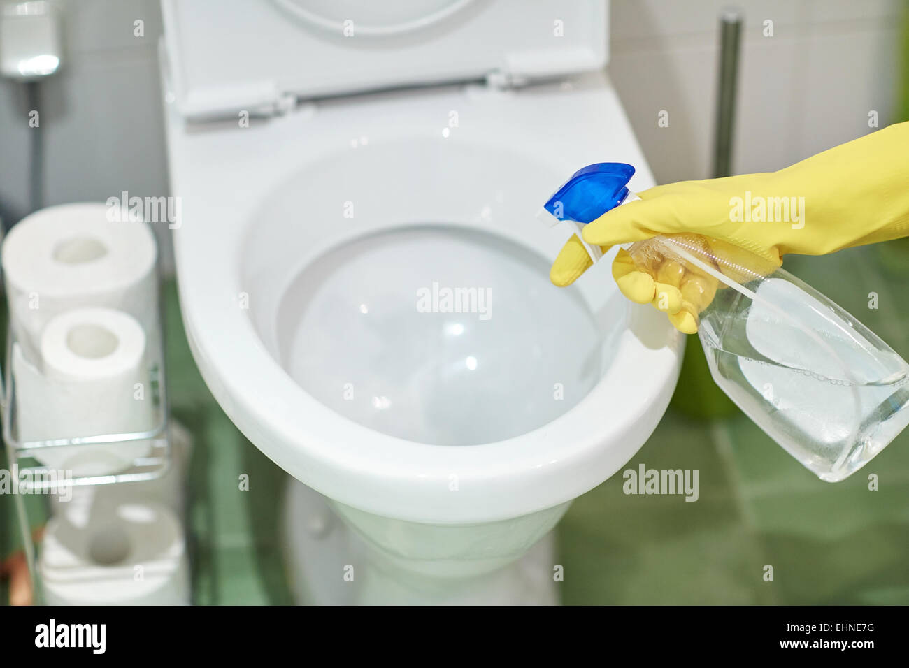 Person cleaning the toilet hires stock photography and images Alamy