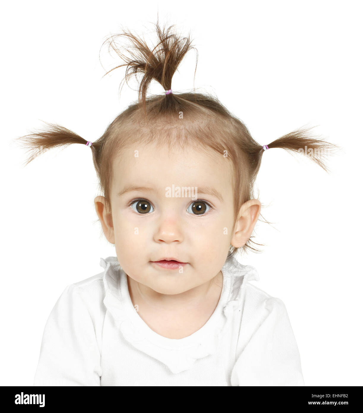 Portrait of little girl with funny ponytail Stock Photo