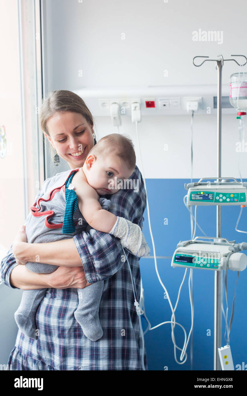 Baby affected by a urinary tract infection (pyelonephritis) hospitalized in the pediatric department of Angoulême hospital, France. Stock Photo