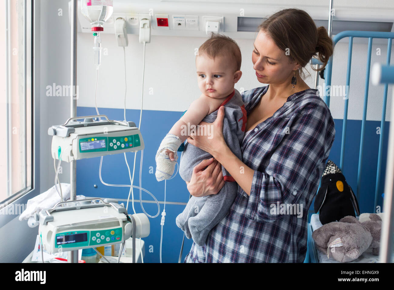 Baby affected by a urinary tract infection (pyelonephritis) hospitalized in the pediatric department of Angoulême hospital, France. Stock Photo