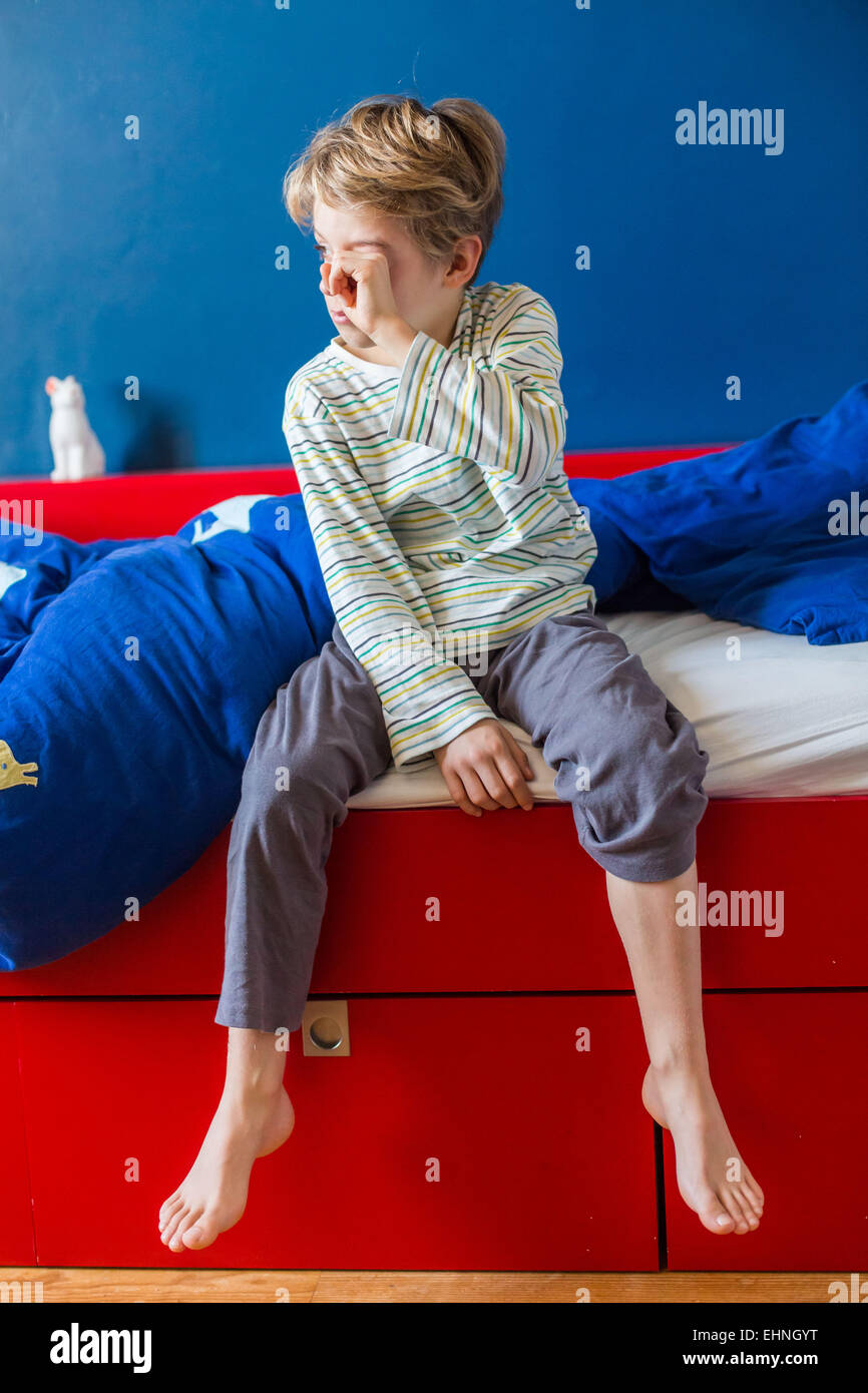 8 year old boy tired. Stock Photo