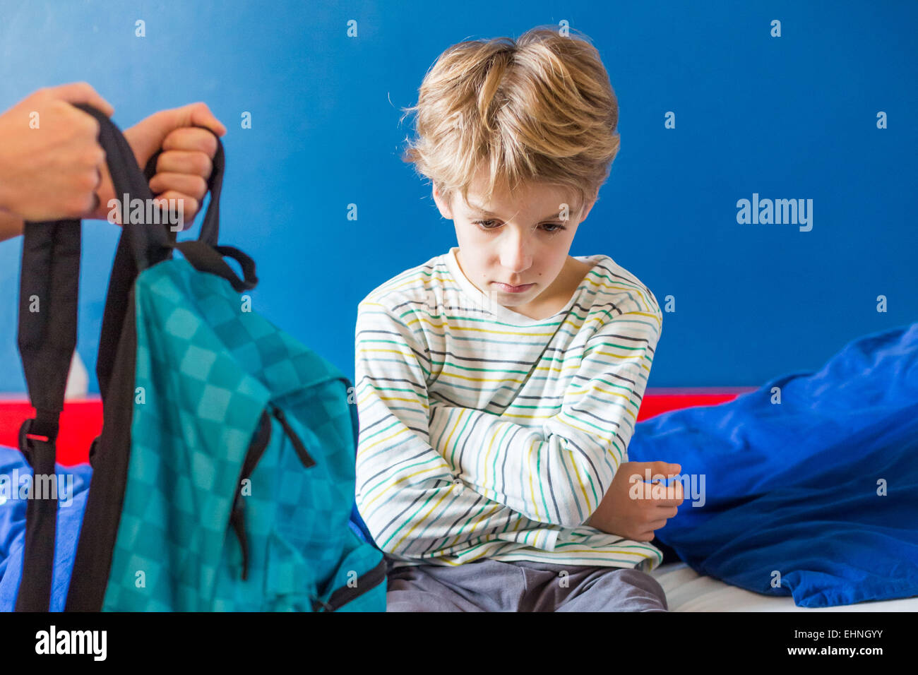 8 year old boy refusing to go to school. Stock Photo