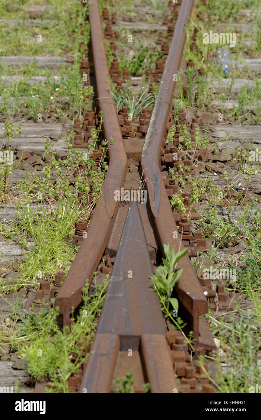 rusty railway track crossing Stock Photo