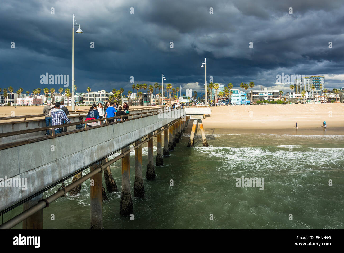Dark storm clouds over the fishing pier and beach in Venice Beach, Los ...