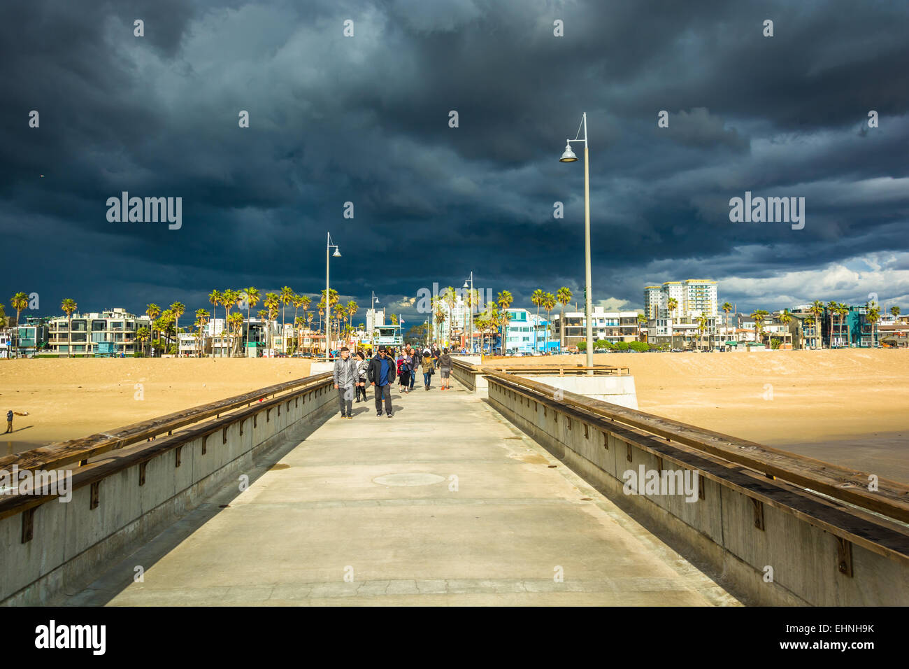 Dark storm clouds over the fishing pier and beach in Venice Beach, Los ...