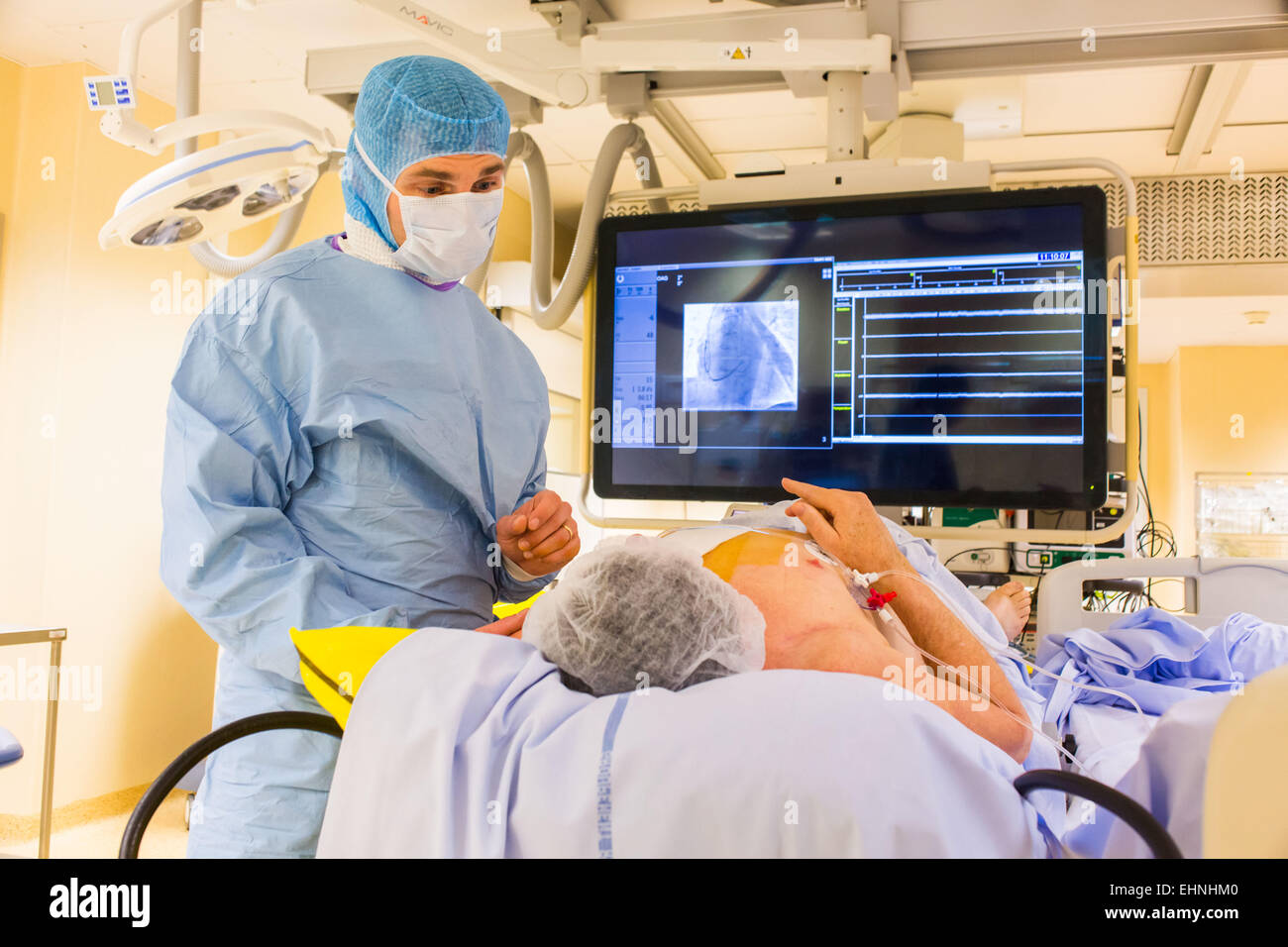 Installation of Automatic Implantable Defibrillator, here, cardiologist