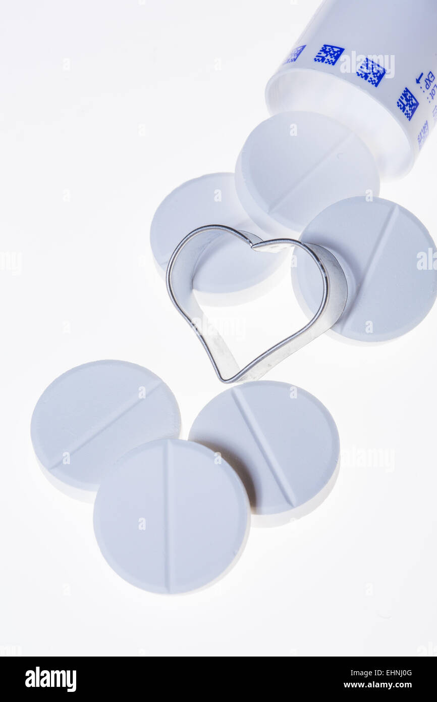 Conceptual image about daily aspirin in prevention of myocardial infarction. Stock Photo