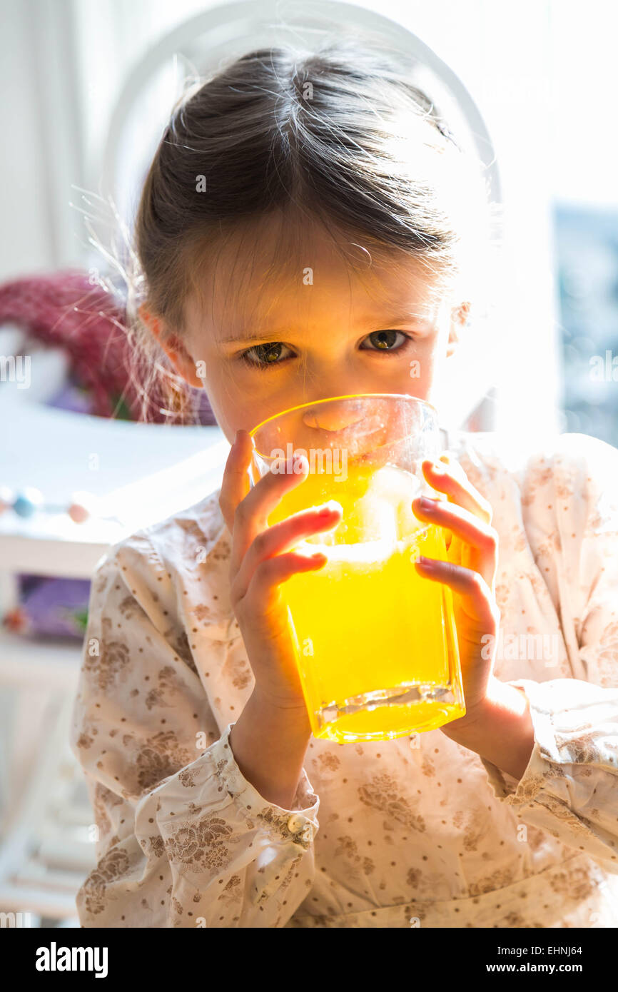 5 year-old girl drinking soft drink. Stock Photo