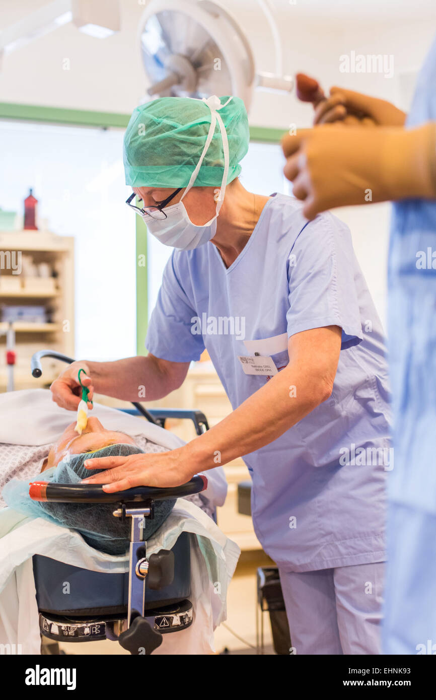 Cataract surgery, installation of the intraocular implant, Bordeaux hospital, France. Stock Photo