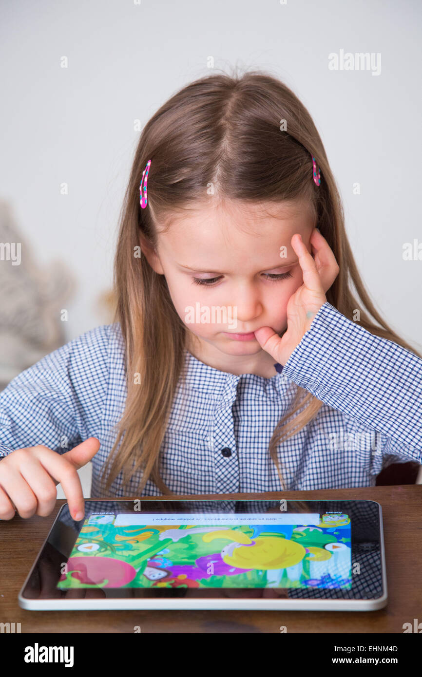 5 yearold girl using tablet computer Stock Photo Alamy