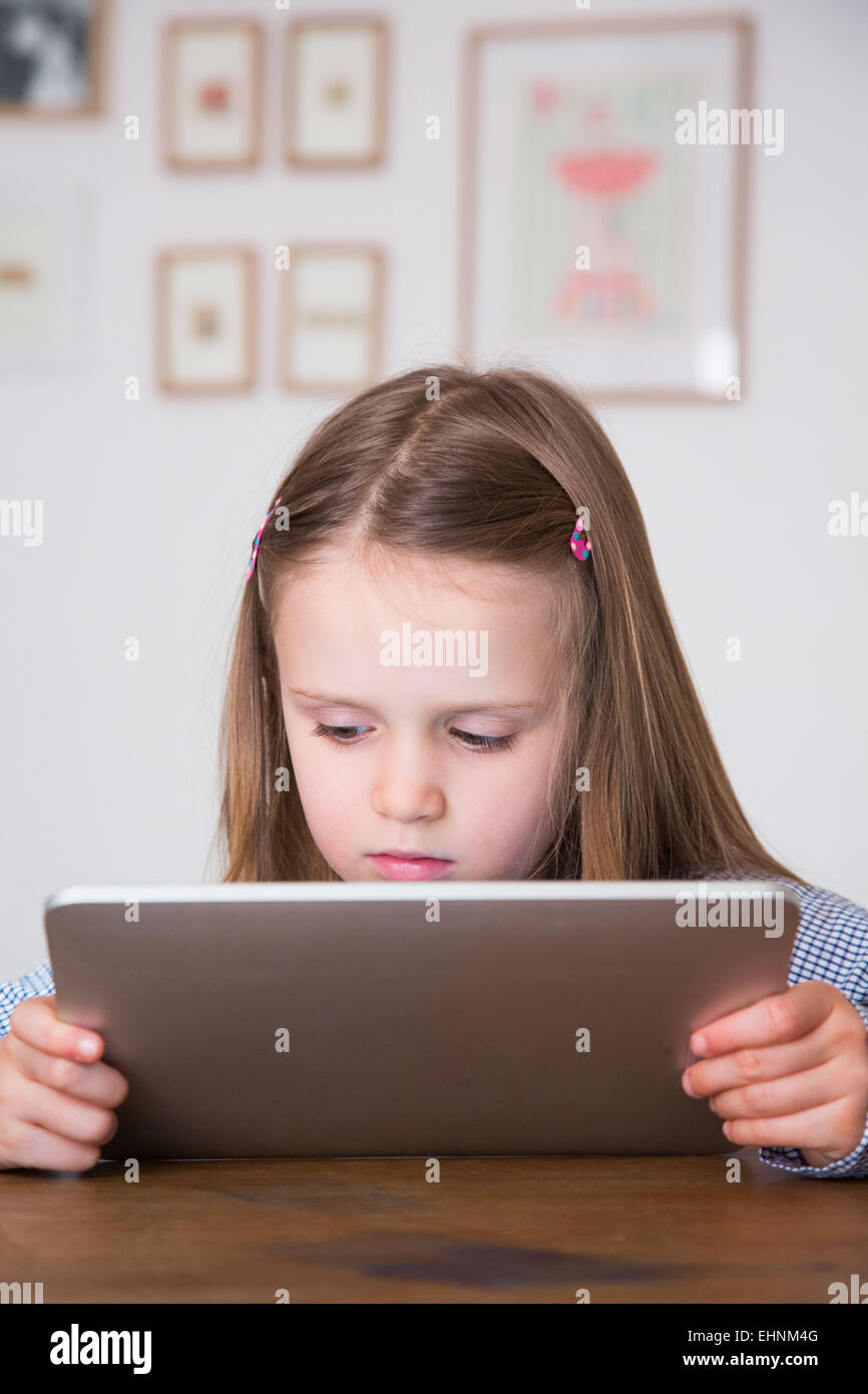 5 yearold girl using tablet computer Stock Photo Alamy
