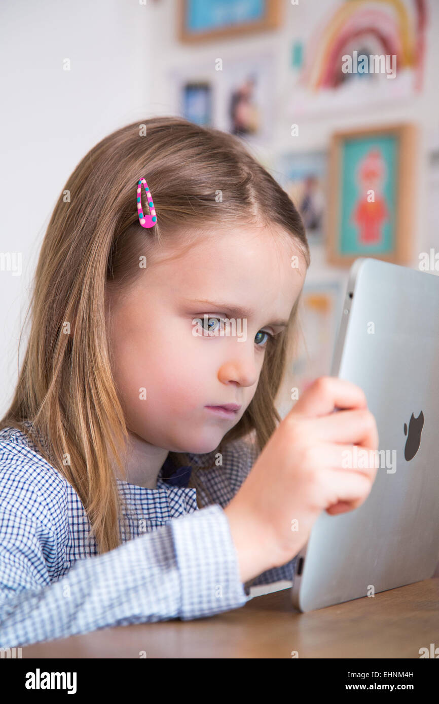 6 year old using tablet hi-res stock photography and images - Alamy