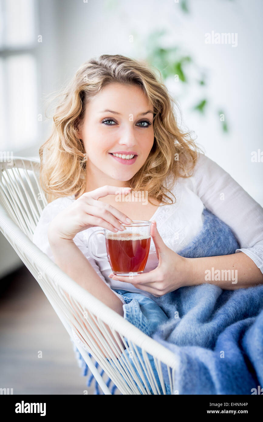 Woman drinking hot beverage Stock Photo Alamy