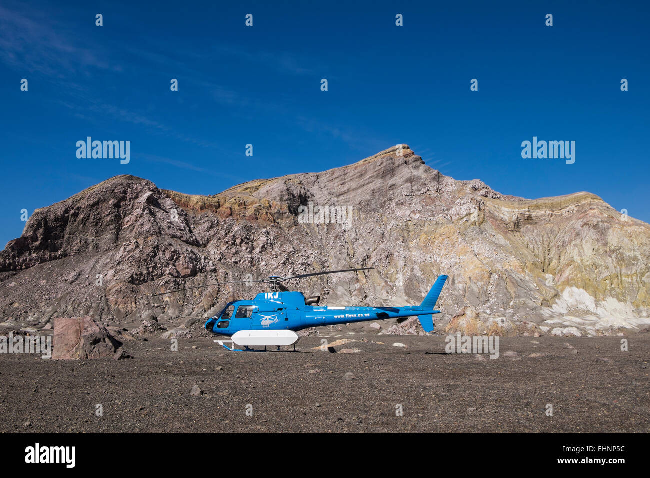 Helicopter on White Island volcano off the coast of New Zealand. Stock Photo