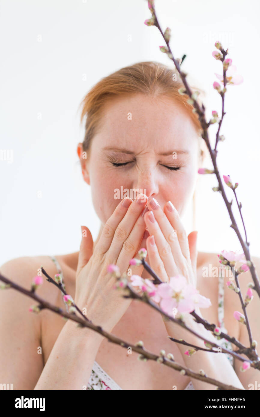 Woman suffering from allergic rhinitis. Stock Photo