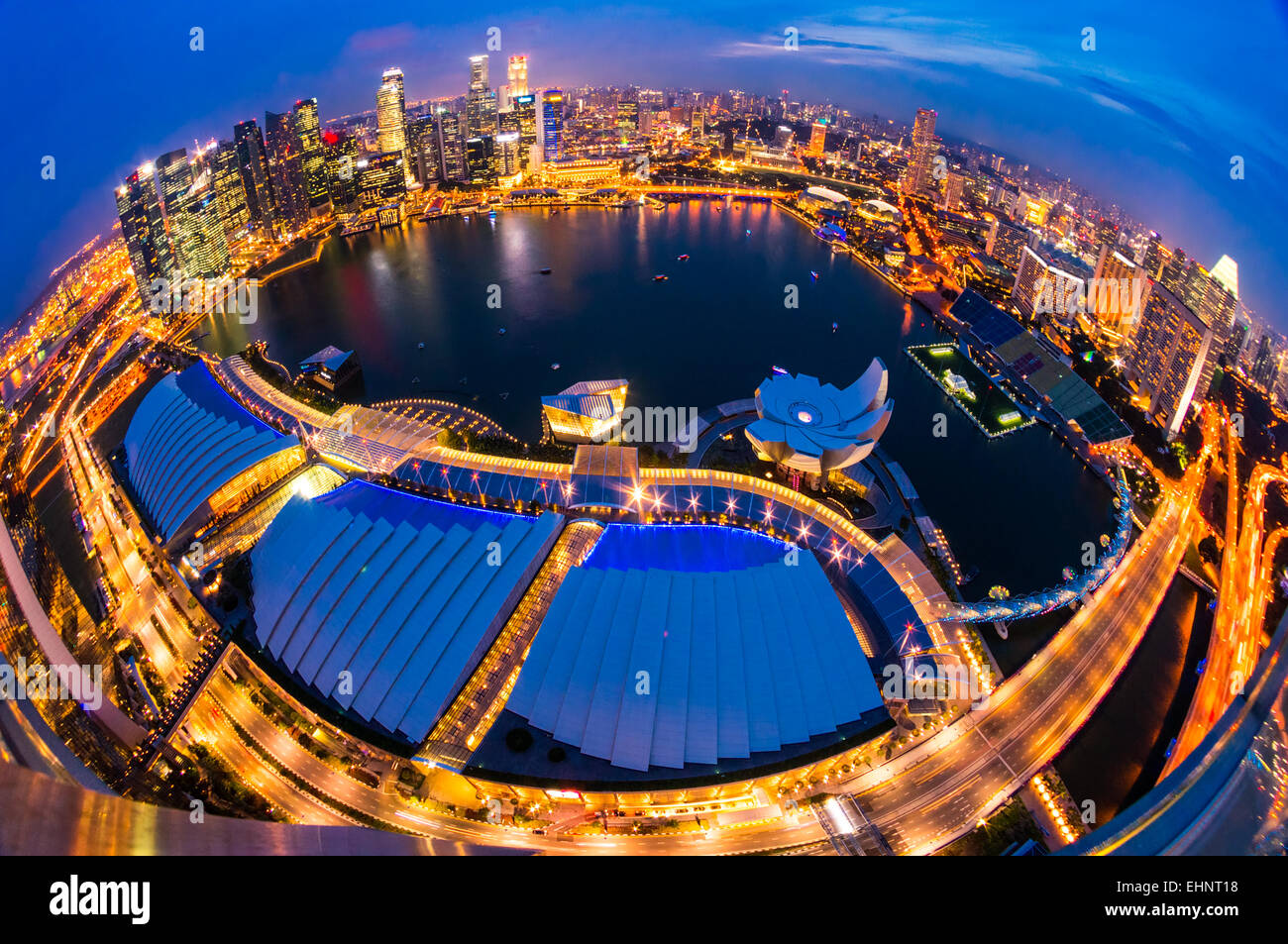 Fish-eye view of Singapore city skyline at sunset Stock Photo - Alamy