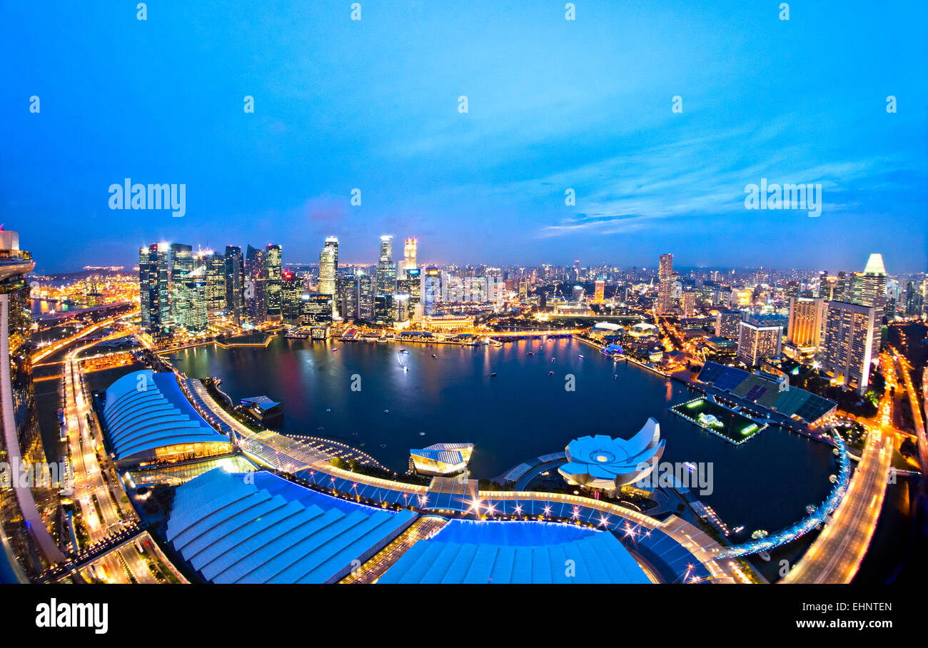 Fish-eye view of Singapore city skyline at sunset Stock Photo - Alamy