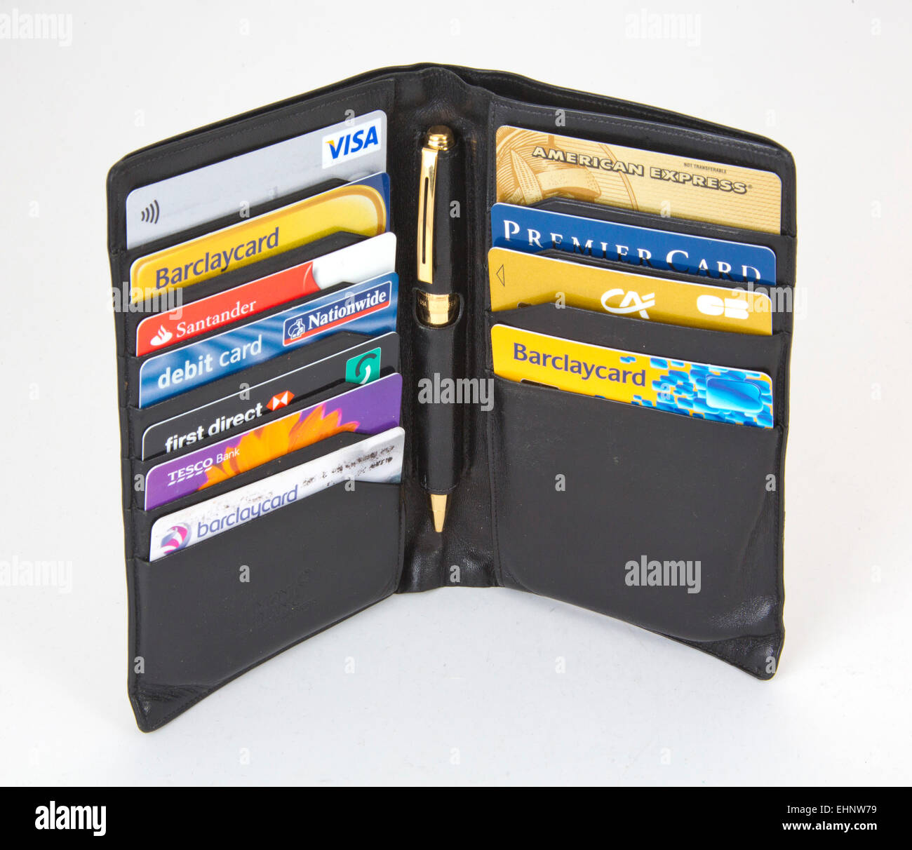 Black wallet with Assortment of credit cards Visa and American express 151148 Credit Cards Stock Photo