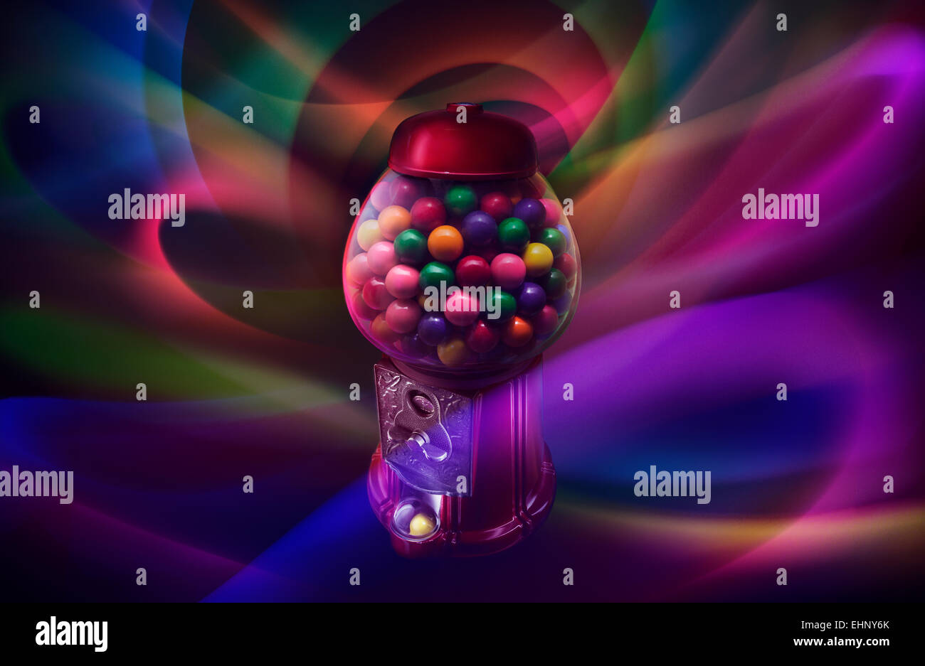 A retro gum ball machine is seen against a light painted background in studio, 2015. (Adrien Veczan) Stock Photo