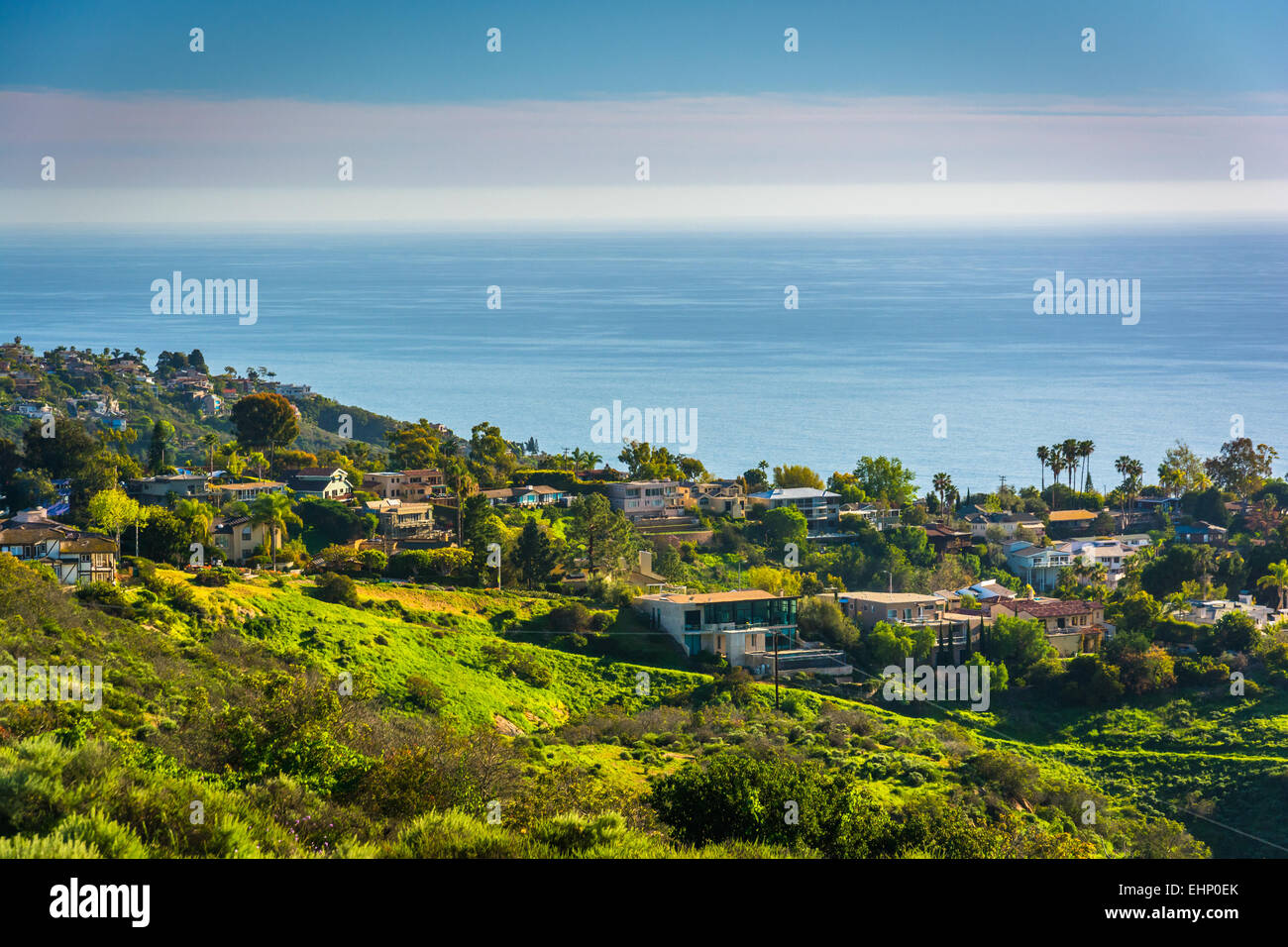 View of green hills and houses overlooking the Pacific Ocean, in Laguna ...