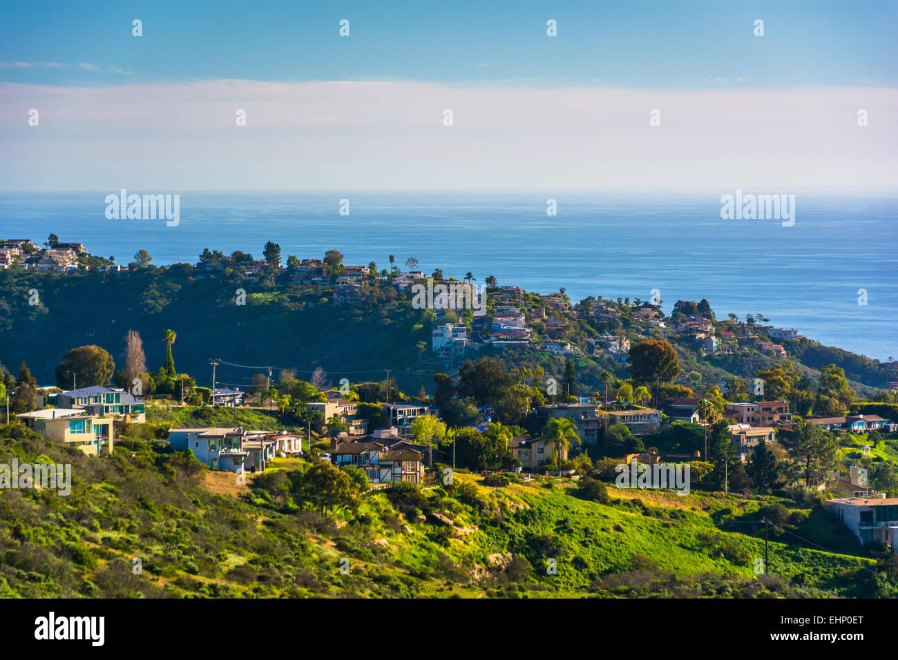 View of green hills and houses overlooking the Pacific Ocean, in Laguna ...