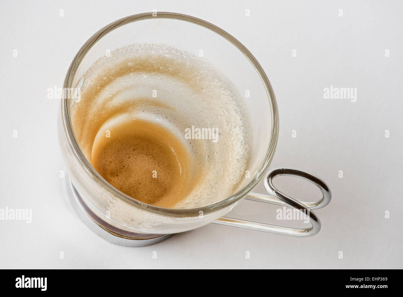 Cup of coffee with rests of coffee spume Stock Photo
