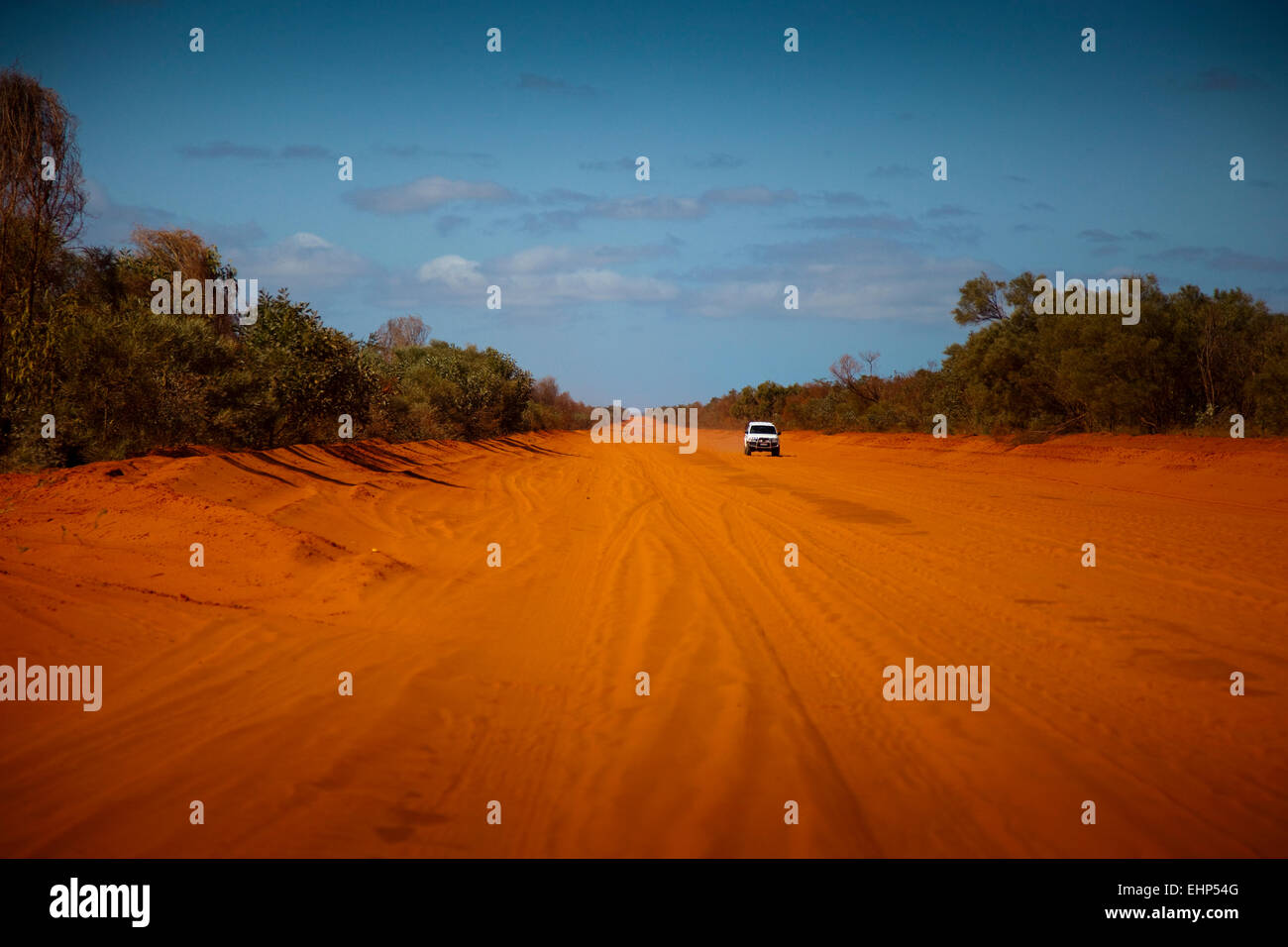 A jeep travels along the remote Cape Leveque Road, Dampier Peninsula, Western Australia Stock Photo