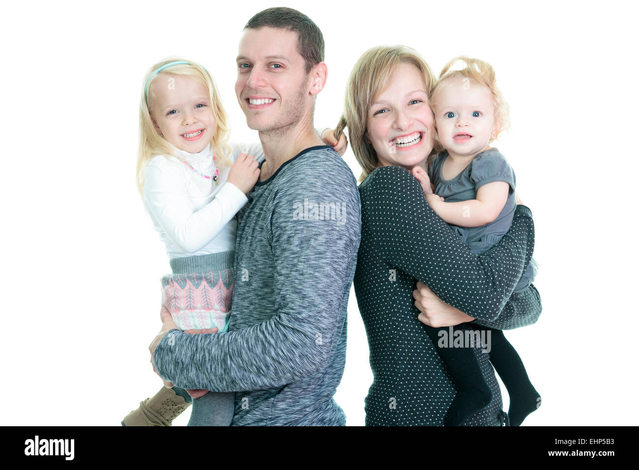A Happy young family isolated on white background Stock Photo - Alamy