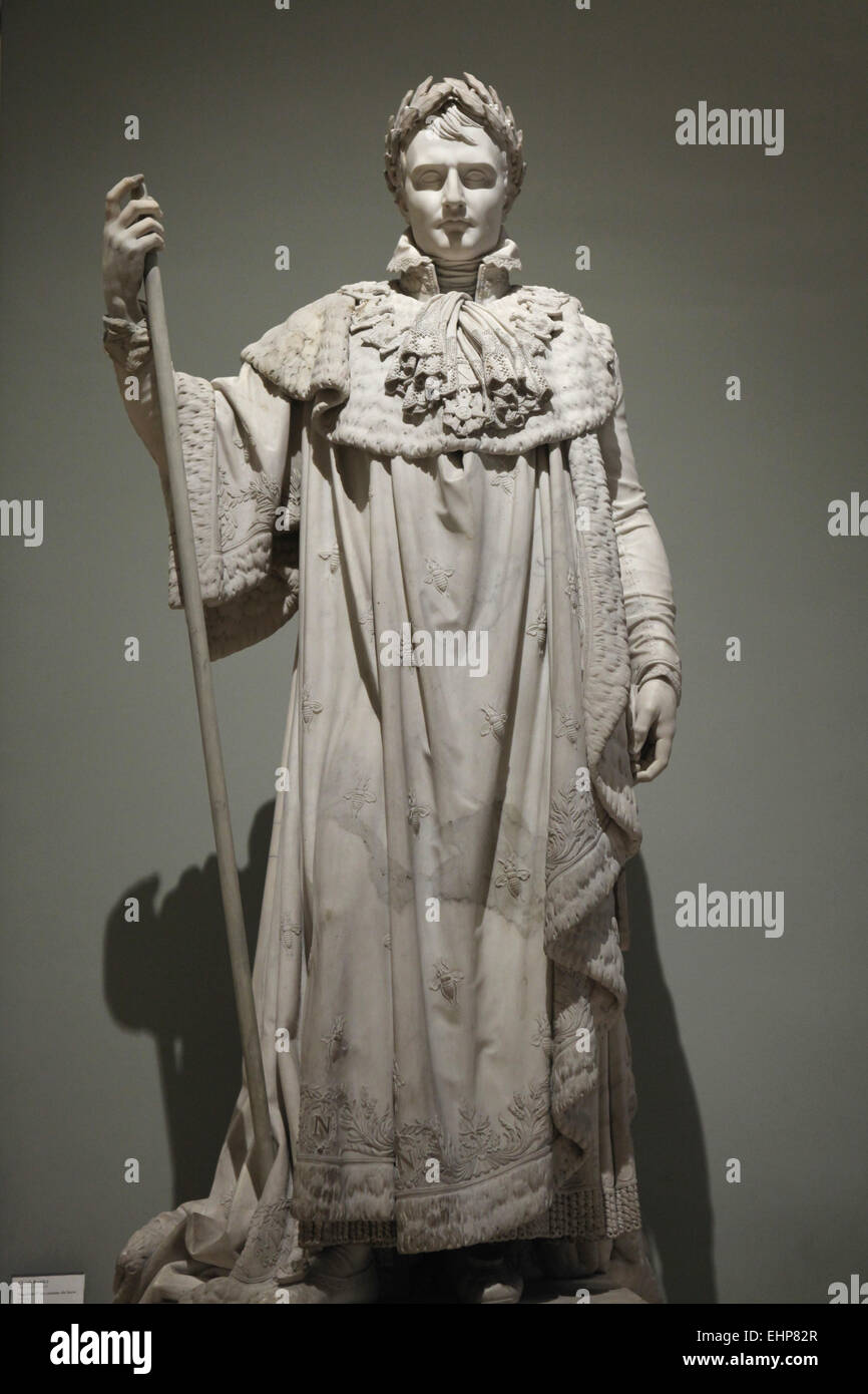 Napoleon Bonaparte in coronation robes (1813). Marble statue by French sculptor Claude Ramey on display in the Louvre Museum in Paris, France. Stock Photo
