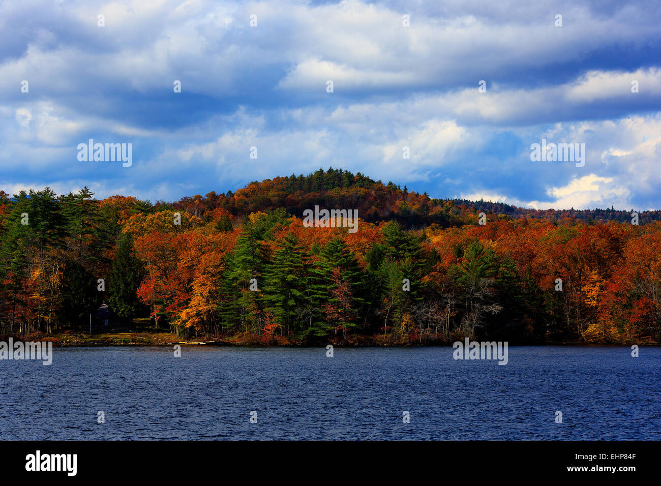 Fall foliage adorns the western shore of Lake Kezar in Lovell, Maine