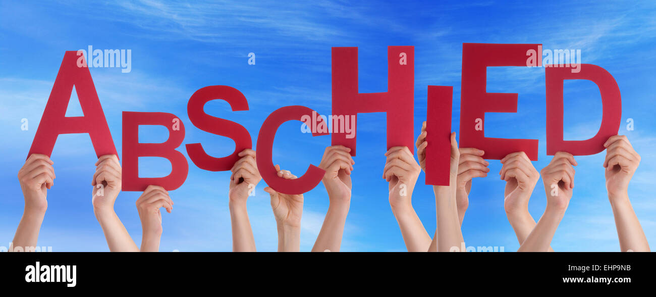 Many Caucasian People And Hands Holding Red Letters Or Characters Building The German Word Abschied Which Means Goodbye On Blue Stock Photo