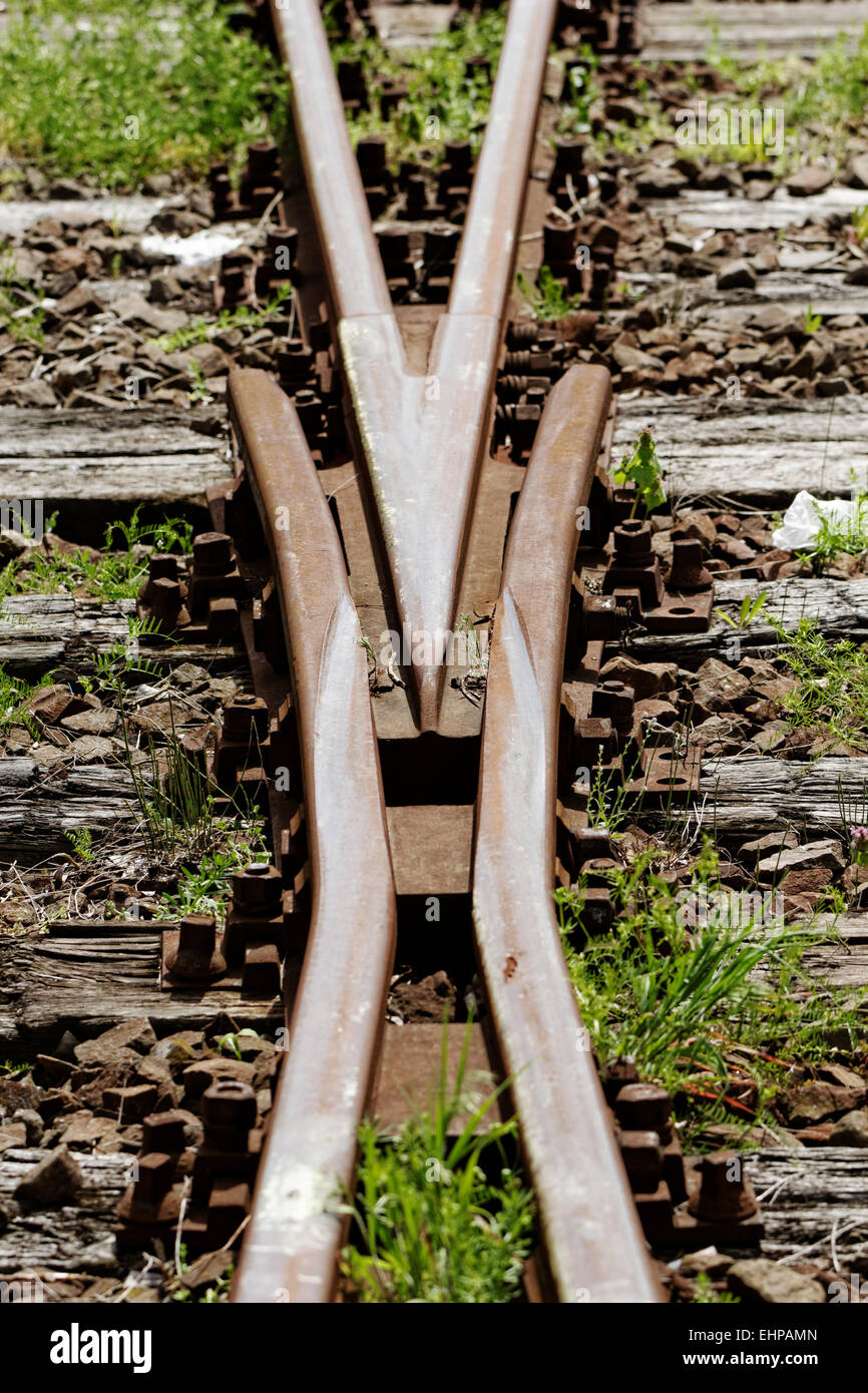 rusty railway track crossing Stock Photo