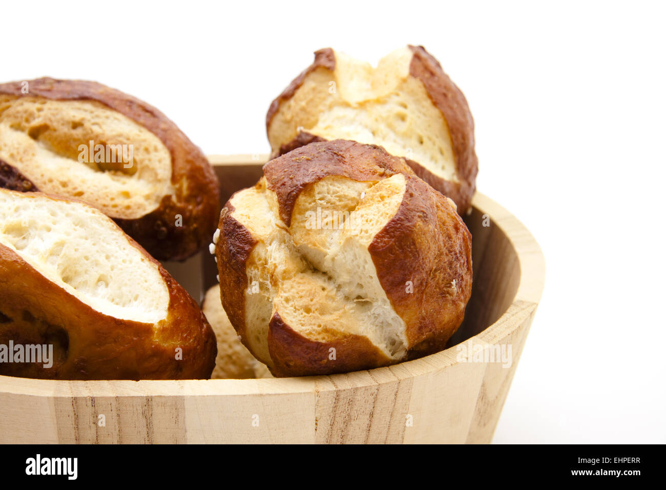 Lye bread rolls in wooden box Stock Photo