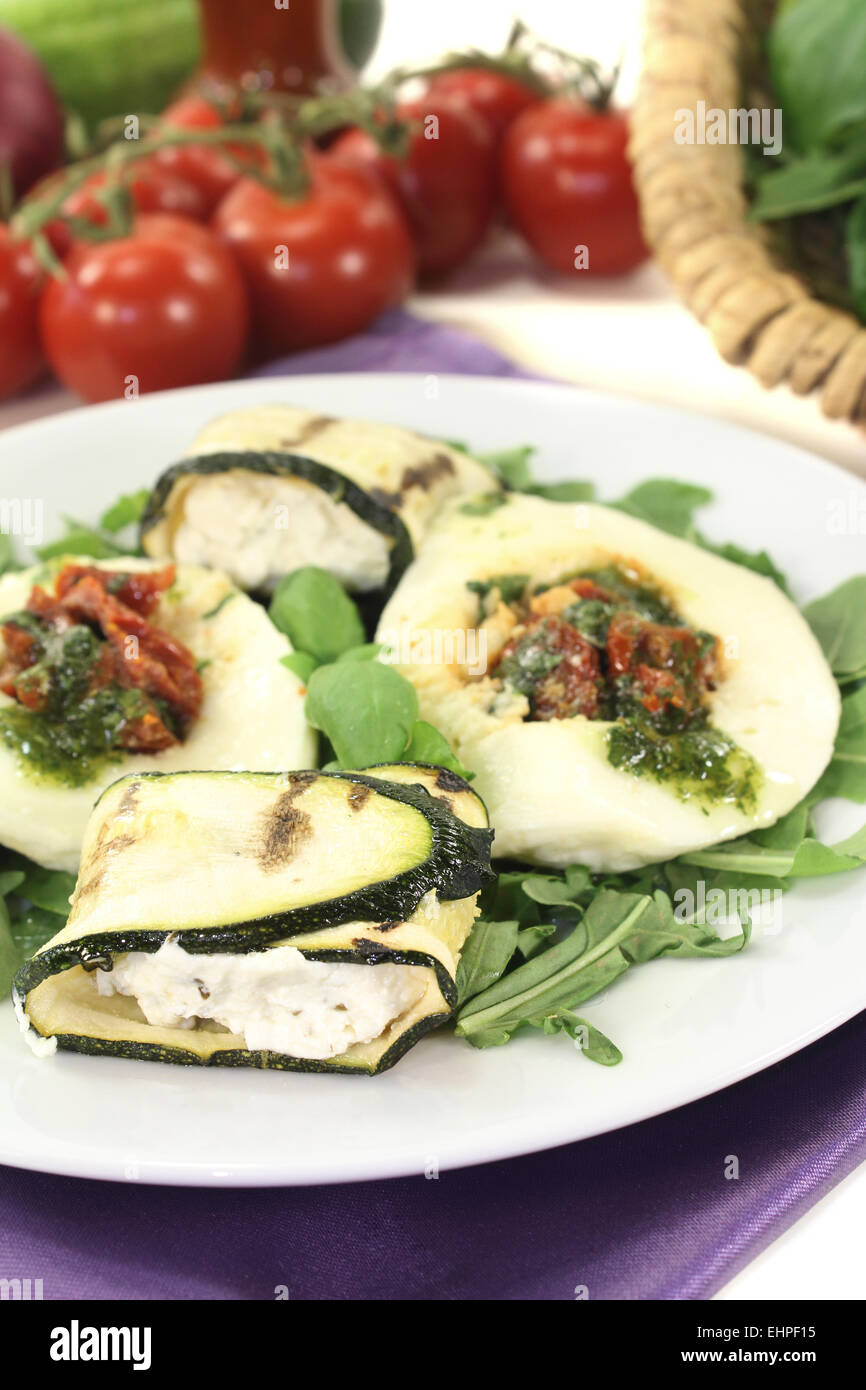 Courgette rolls and filled mozzarella with basil Stock Photo