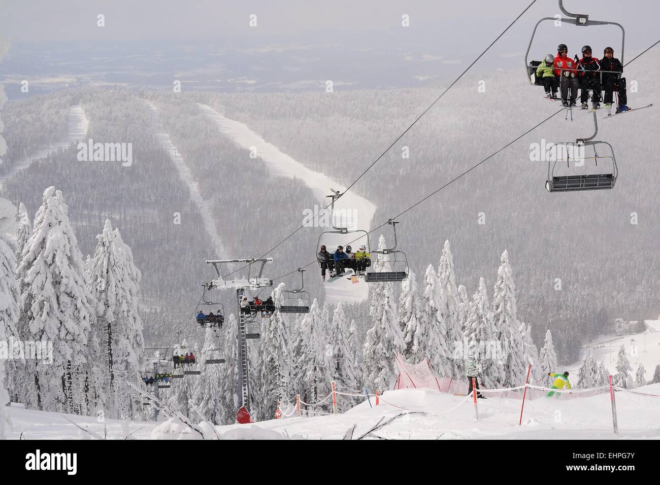 Chairlift in full operation Stock Photo