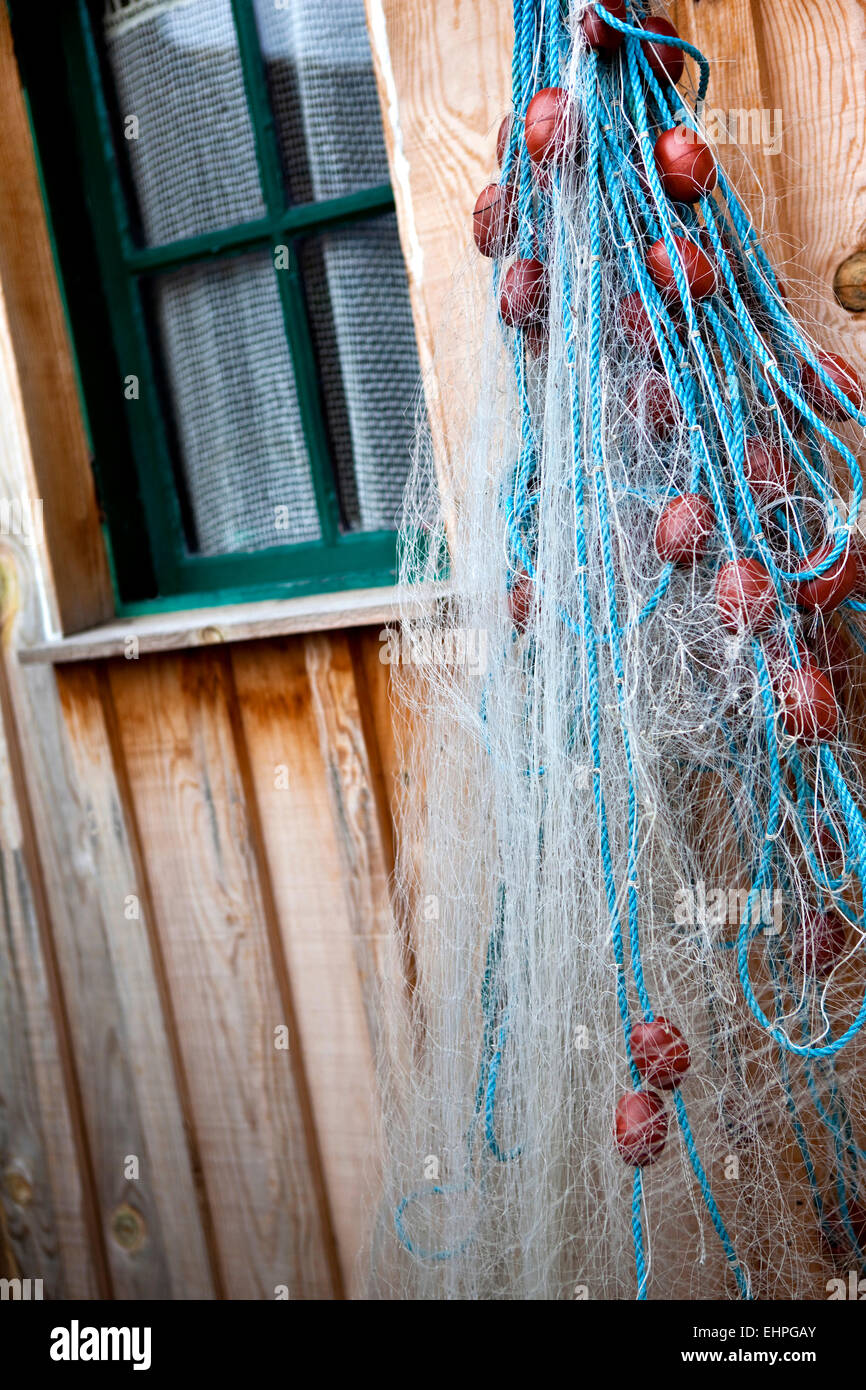 Fishing net hanging on a wall hi-res stock photography and images - Alamy