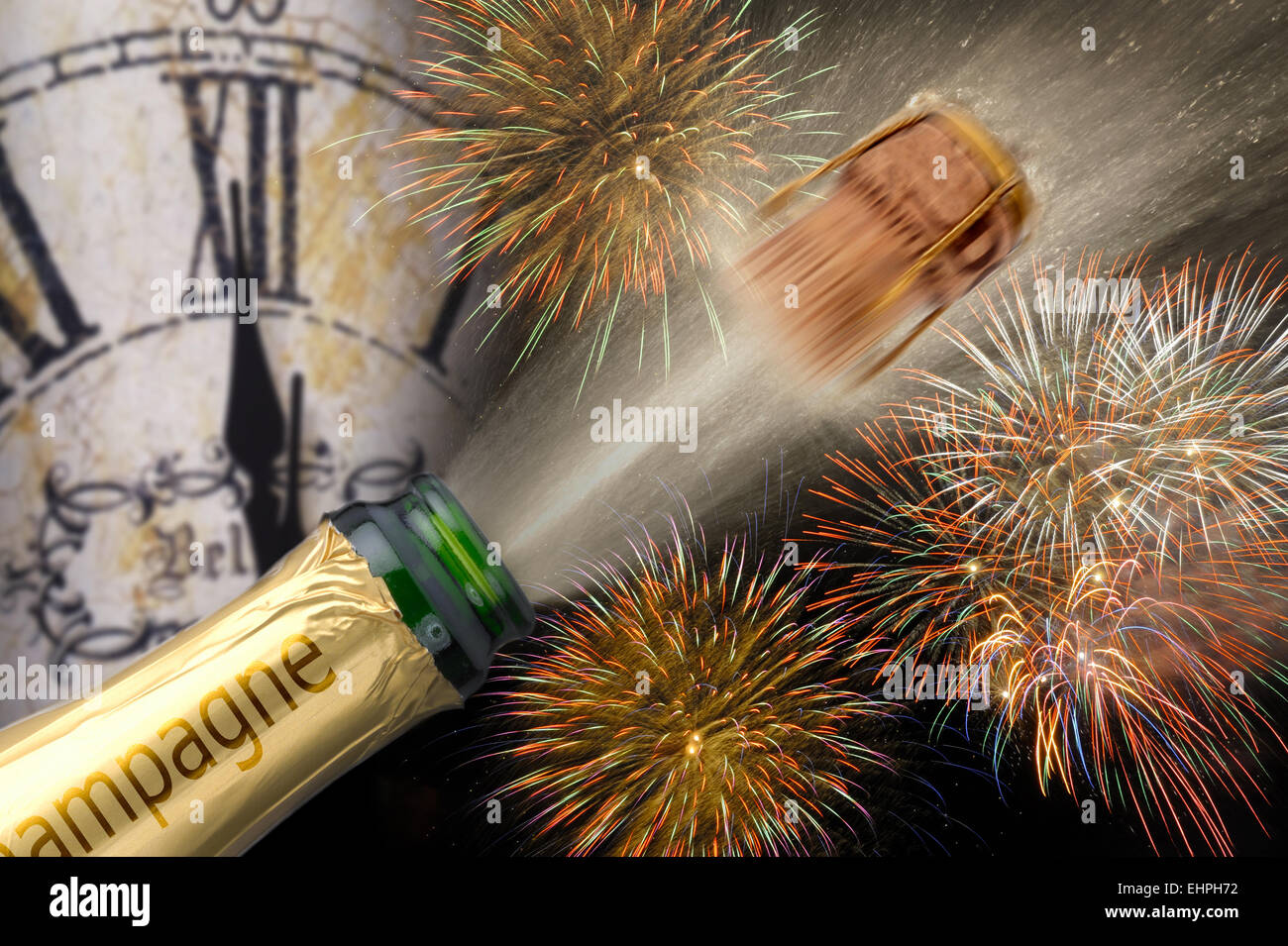 popping champagne  and watch at new year Stock Photo