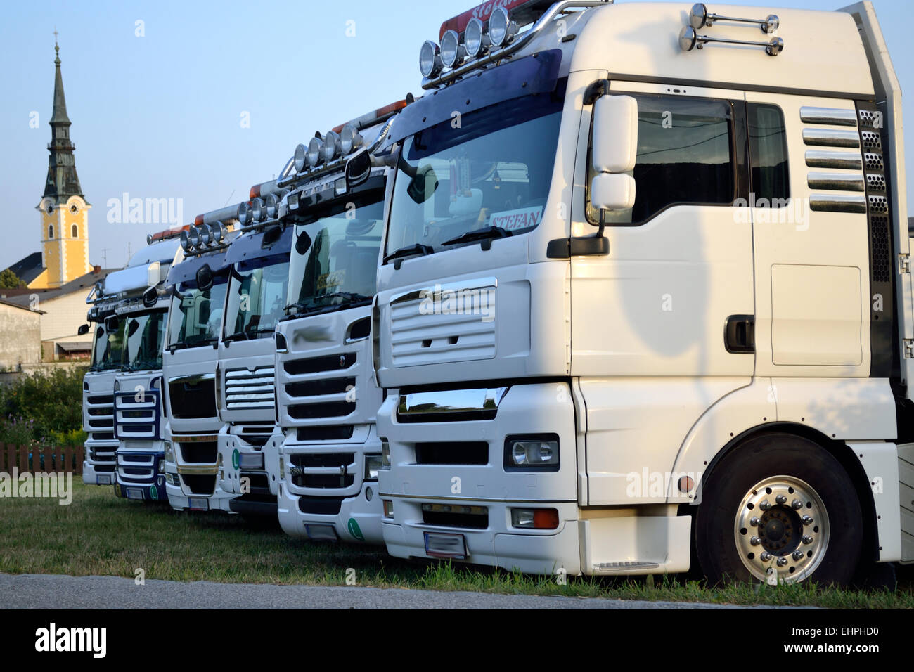 Trucks lined up Stock Photo - Alamy