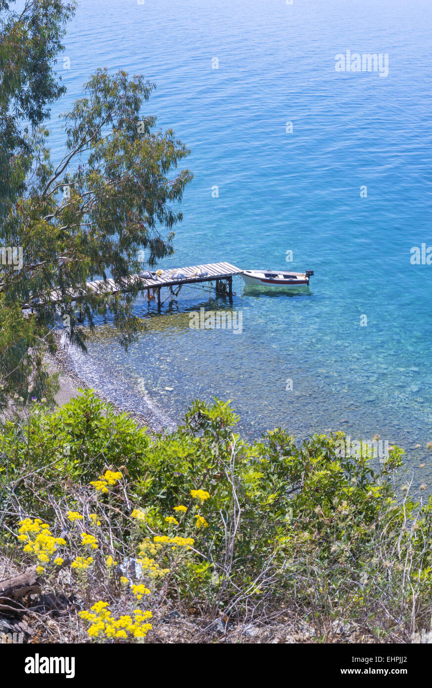 Evia Limni Greek island beach dock boat seascape Stock Photo