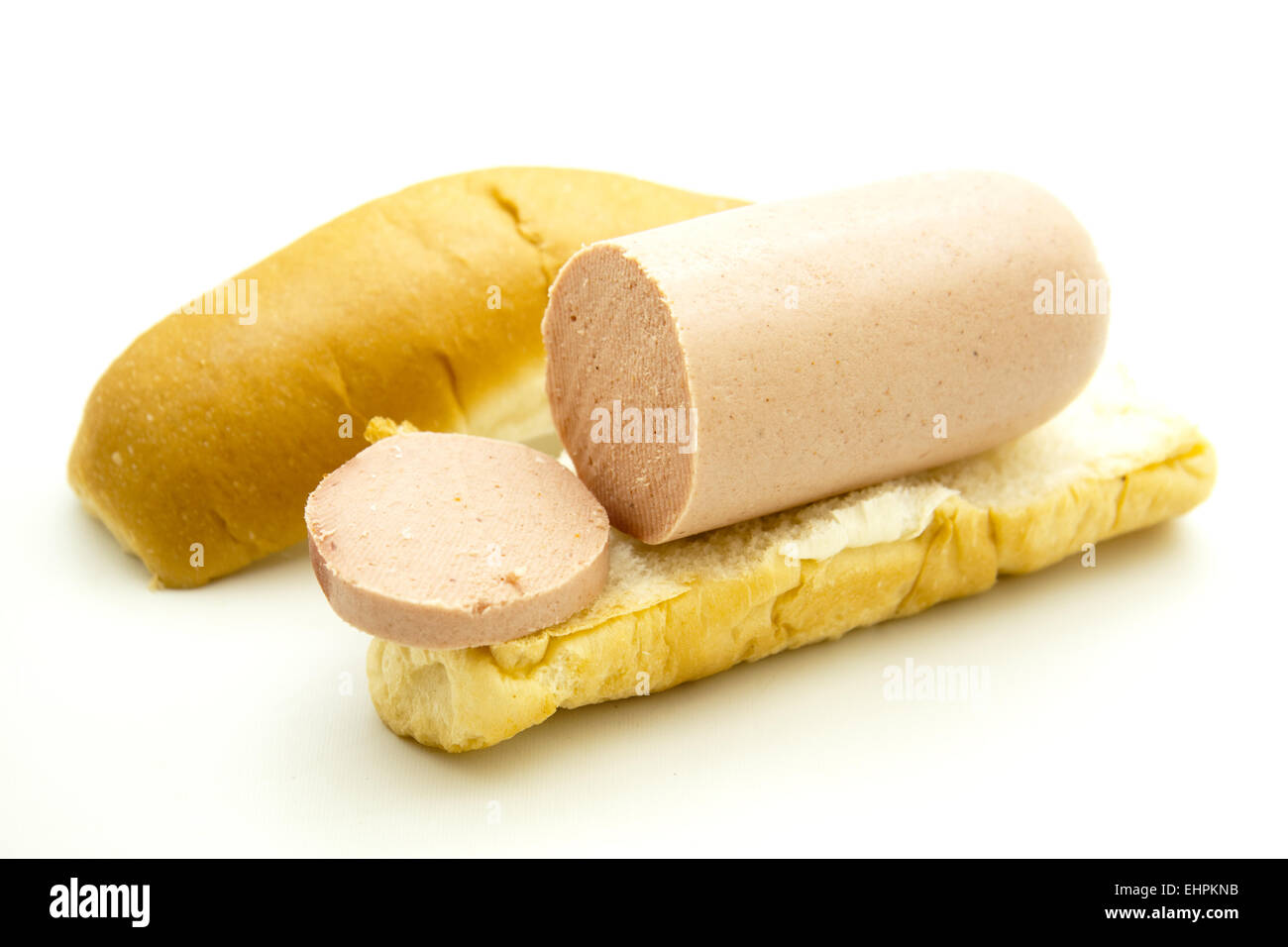 Ham sausage on roll Stock Photo Alamy