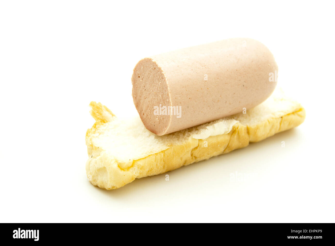 Ham sausage on roll Stock Photo Alamy