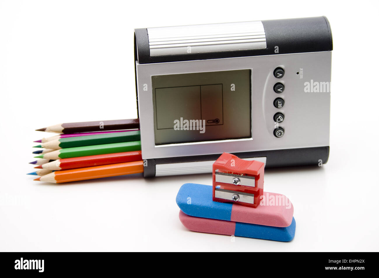 Coloured pencils in pencil holder Stock Photo - Alamy