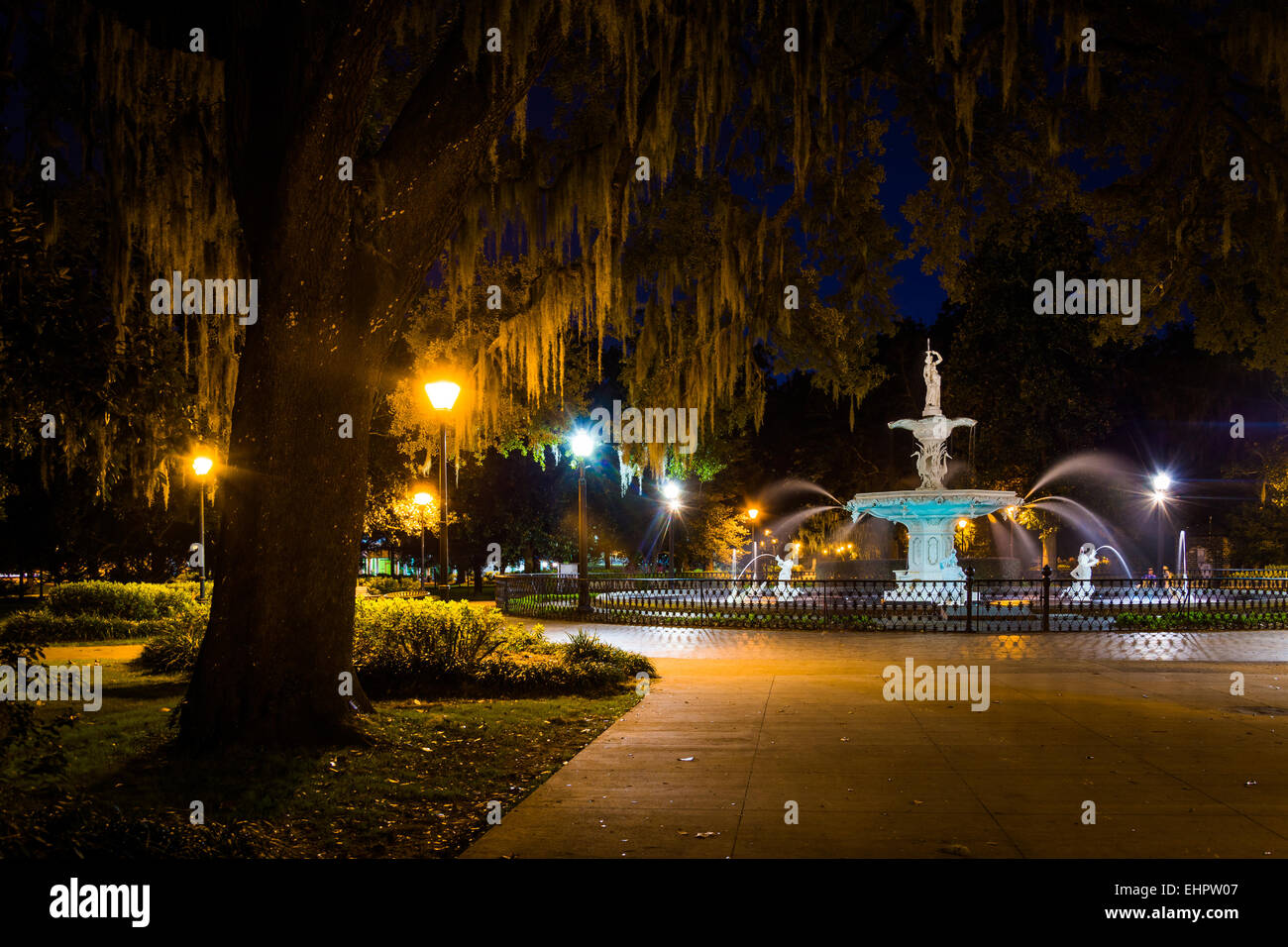 Oak tree and fountain at night in Forsyth Park, Savannah, Stock